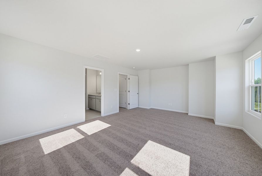 Spacious, unfurnished interior of a new home in Sweetbrier, Durham (Image 23).