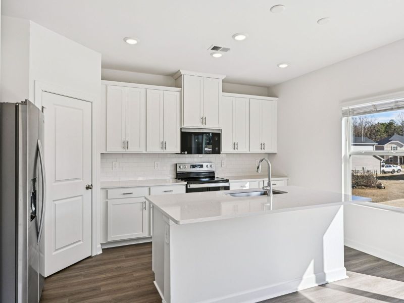 Furnished interior view inside a new home in Harper Landing, Stanley (Image 5).