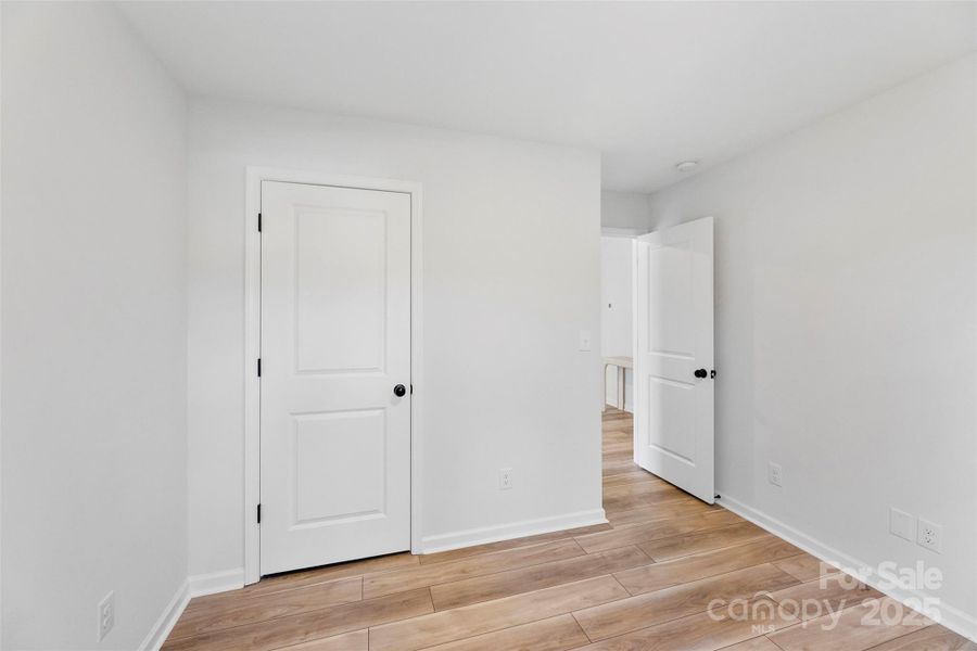 Spacious, unfurnished interior of a new home in Surrey Woods, Charlotte (Image 23).