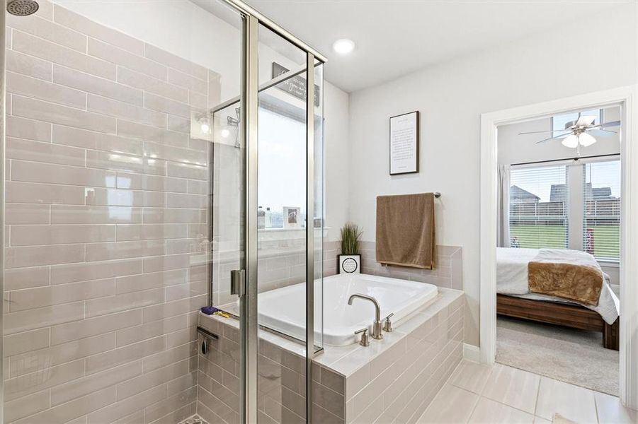Primary bathroom with shower and a separate tub Primary bathroom with shower and a separate tub