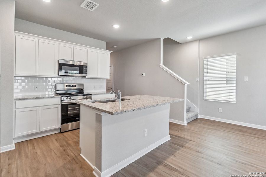 Furnished interior view inside a new home in Abbott Run, San Antonio (Image 4).