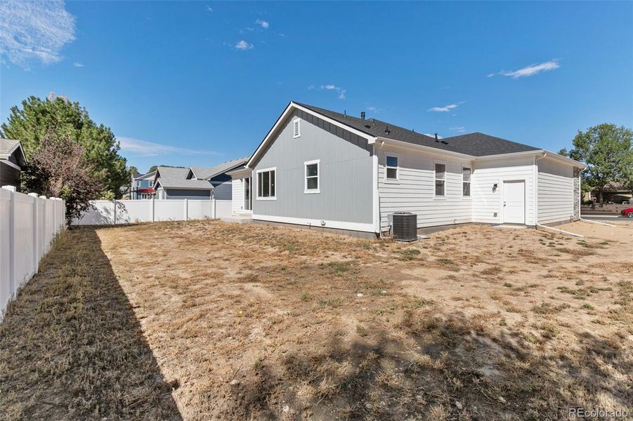 Backyard is fenced on 3 sides.