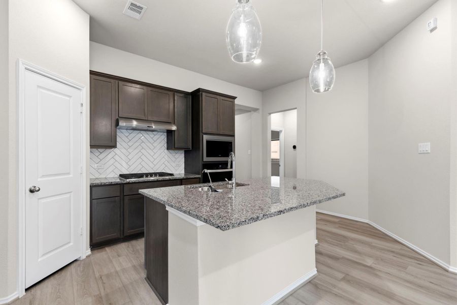 Furnished interior view inside a new home in Grand Central Park, Conroe (Image 6).