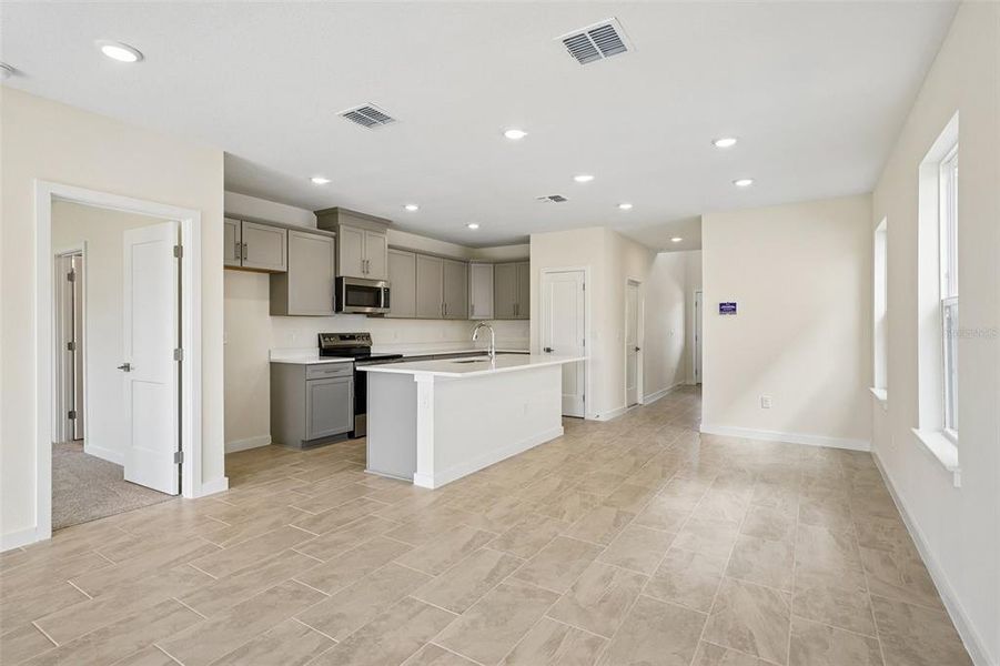 Furnished interior view inside a new home in Grasslands West, Lakeland (Image 11).