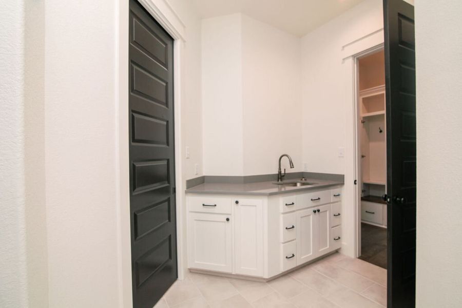 Representative furnished interior of a home built from the The Julia by Reece Homes in Pebble Creek, College Station (Image 50).