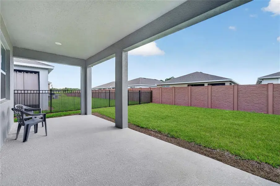 Exterior details and patio area of a home in , Ocala (Image 3).