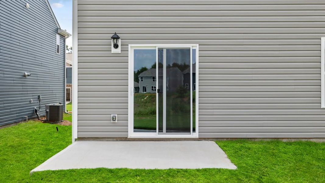 Front exterior of a new home in Durbin Meadows, Fountain Inn, SC, highlighting curb appeal (Image 17). Front exterior of a new home in Durbin Meadows, Fountain Inn, SC, highlighting curb appeal (Image 17).
