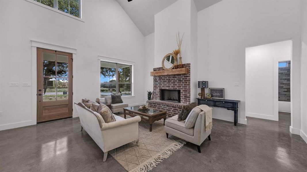 Vaulted ceilings with large windows for all that natural light to shine through your new home!