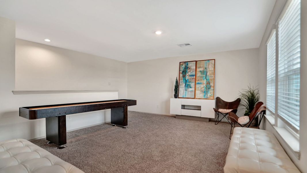 Representative furnished interior of a home built from the MITCHELL by D.R. Horton in Westward Pointe, Sealy (Image 14).