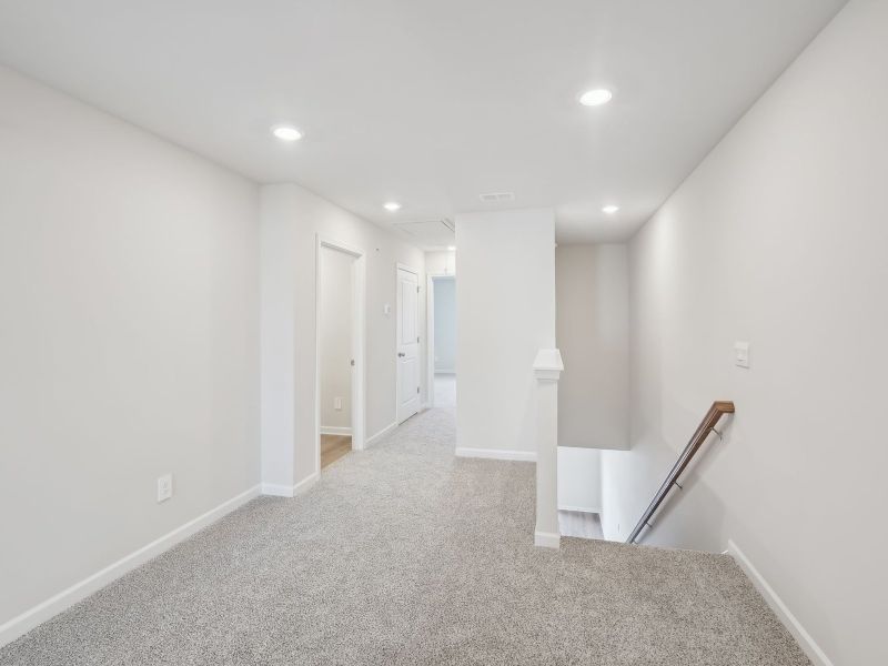 Spacious, unfurnished interior of a new home in Brooks Lake, Loganville (Image 15).
