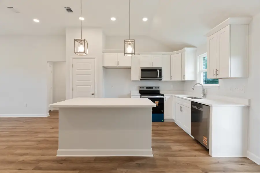 Furnished interior view inside a new home in Southern Charm, Crestview (Image 5). Furnished interior view inside a new home in Southern Charm, Crestview (Image 5).