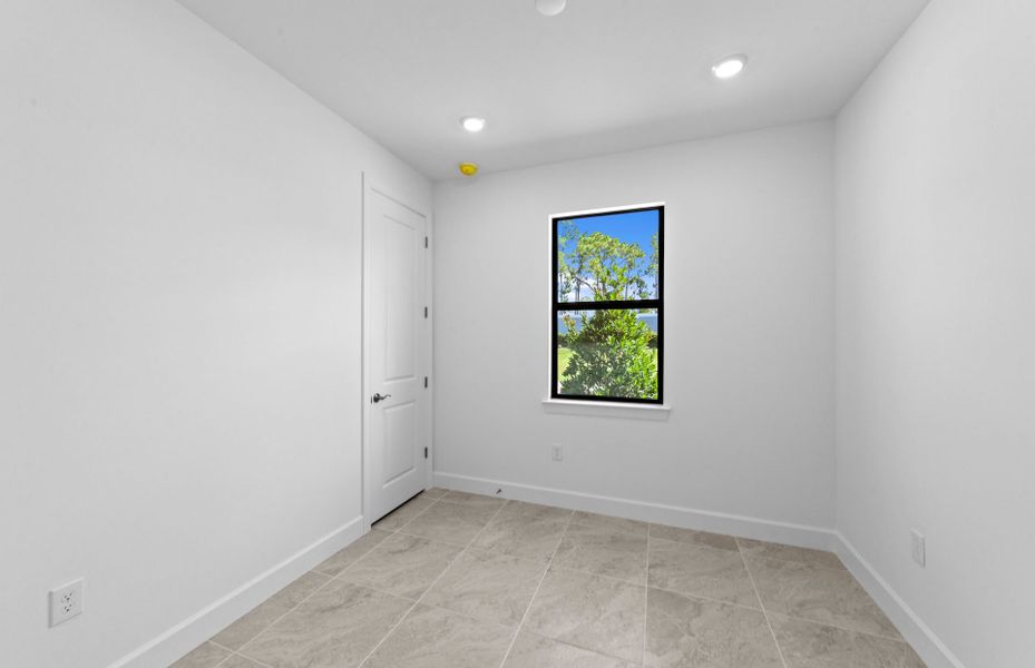 Spacious, unfurnished interior of a new home in Arbor Oaks, North Port (Image 14). Spacious, unfurnished interior of a new home in Arbor Oaks, North Port (Image 14).