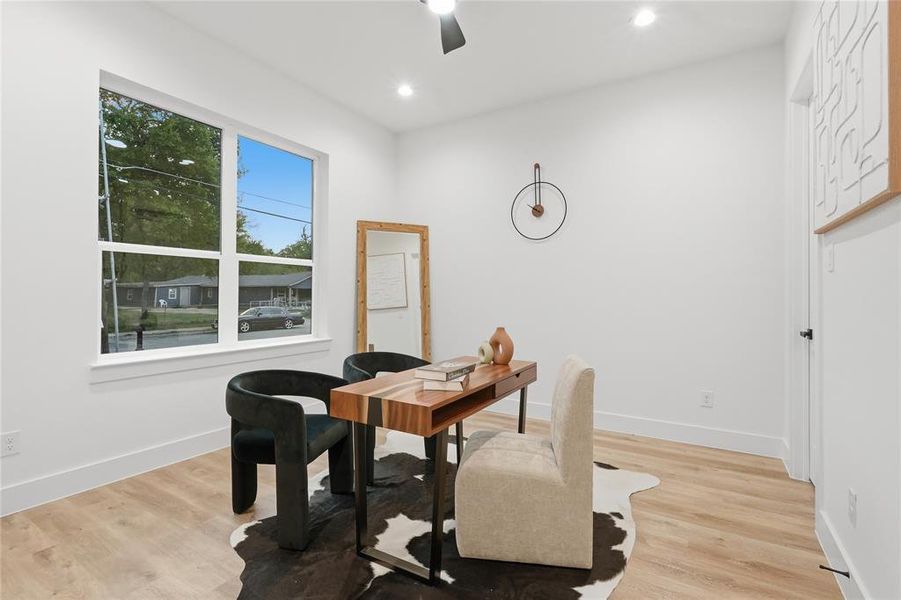 Dining area featuring light wood-style floors, ceiling fan, recessed lighting, and an office area