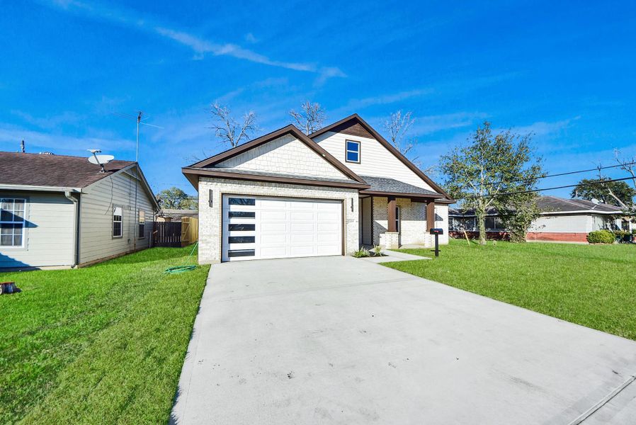 Front exterior of a new home in , Pasadena, TX, highlighting curb appeal (Image 25).