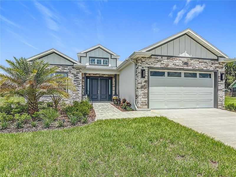 Front exterior of a new home in , Wildwood, FL, highlighting curb appeal (Image 2).