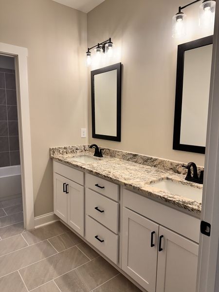 Furnished interior view inside a new home in The Reserve at Red Oaks, Carrollton (Image 17).