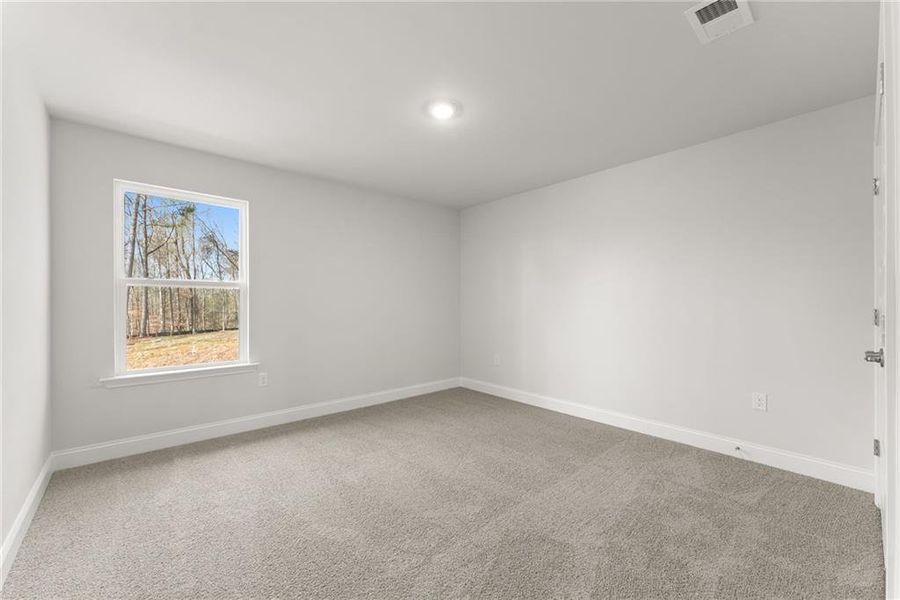 Spacious, unfurnished interior of a new home in The Fields of Walnut Creek, Pendergrass (Image 13).