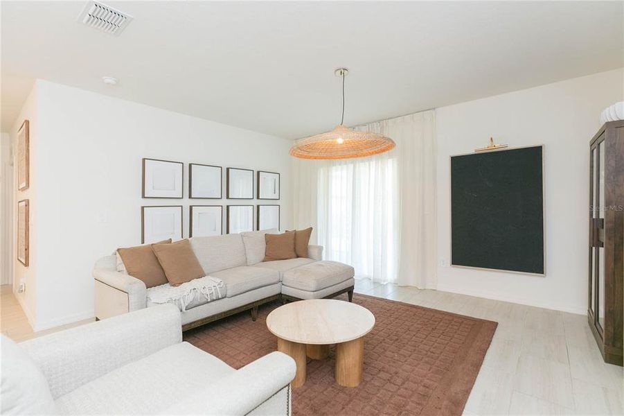 Furnished interior view inside a new home in Angeline, Land O' Lakes (Image 49).