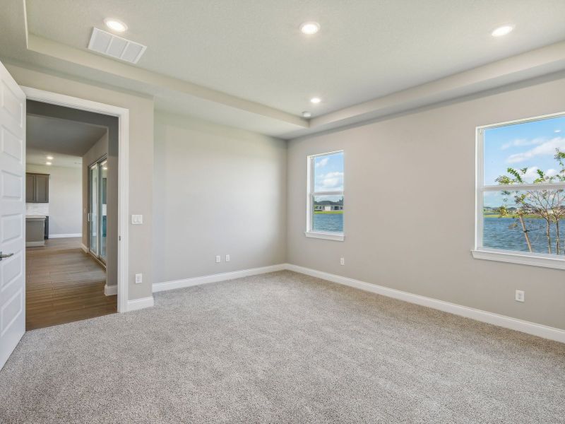 Primary Bedroom in the Onyx floorplan at 6406 NW Sweetwood Drive