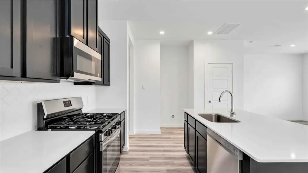 Furnished interior view inside a new home in City Gate, Houston (Image 6).
