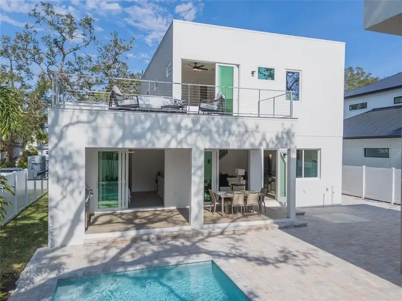 Exterior details and patio area of a home in , Sarasota (Image 3).