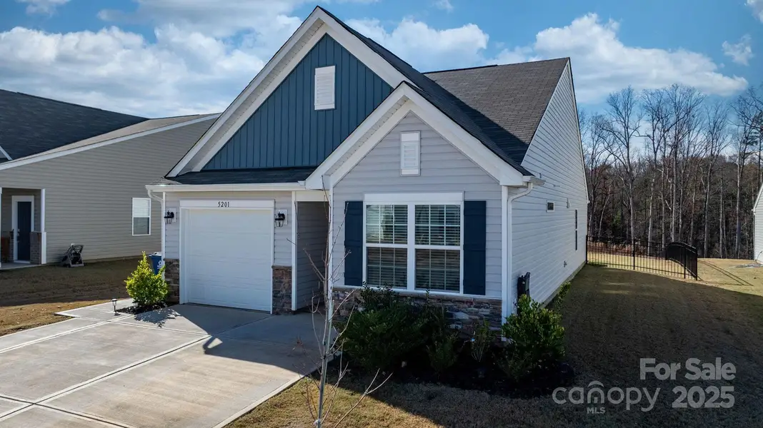 Front exterior of a new home in Legacy Ridge, Catawba, NC, highlighting curb appeal (Image 1).