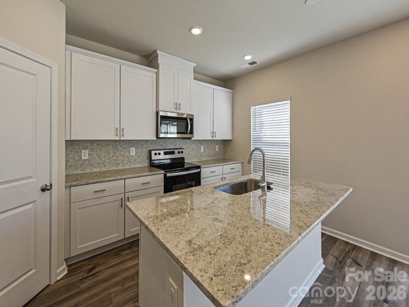 Photo is not of the actual home, but is an inspirational photo of builder’s model home and may depict options, furnishings, and/or decorator features that are not included