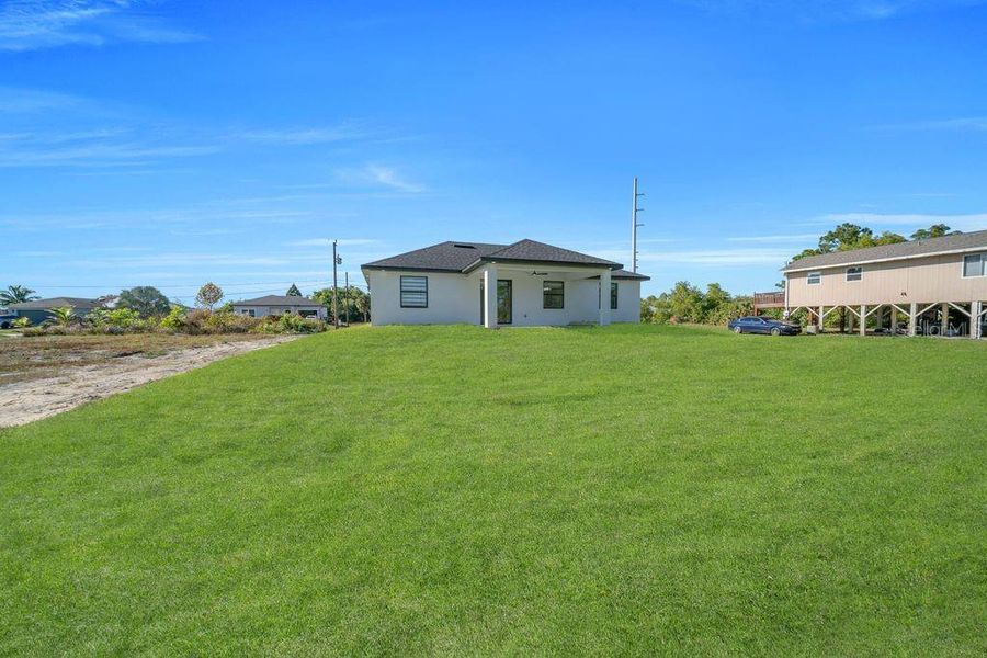 Exterior details and patio area of a home in , Lehigh Acres (Image 24).