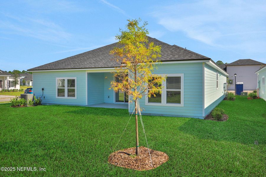 Exterior details and patio area of a home in Silver Landing at SilverLeaf, St. Augustine (Image 23).