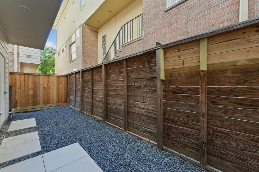 Exterior details and patio area of a home in , Houston (Image 20).