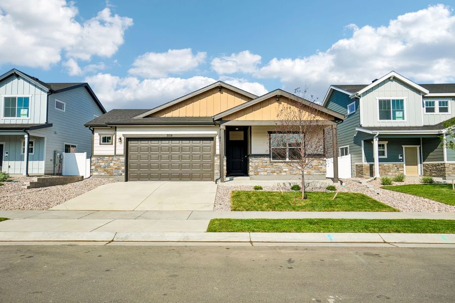 Front exterior of a new home in Union Colony West, Greeley, CO, highlighting curb appeal (Image 29).