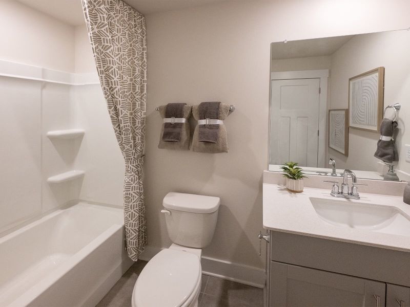 Furnished interior view inside a new home in Waterside - Boardwalk Series, Longs (Image 10).