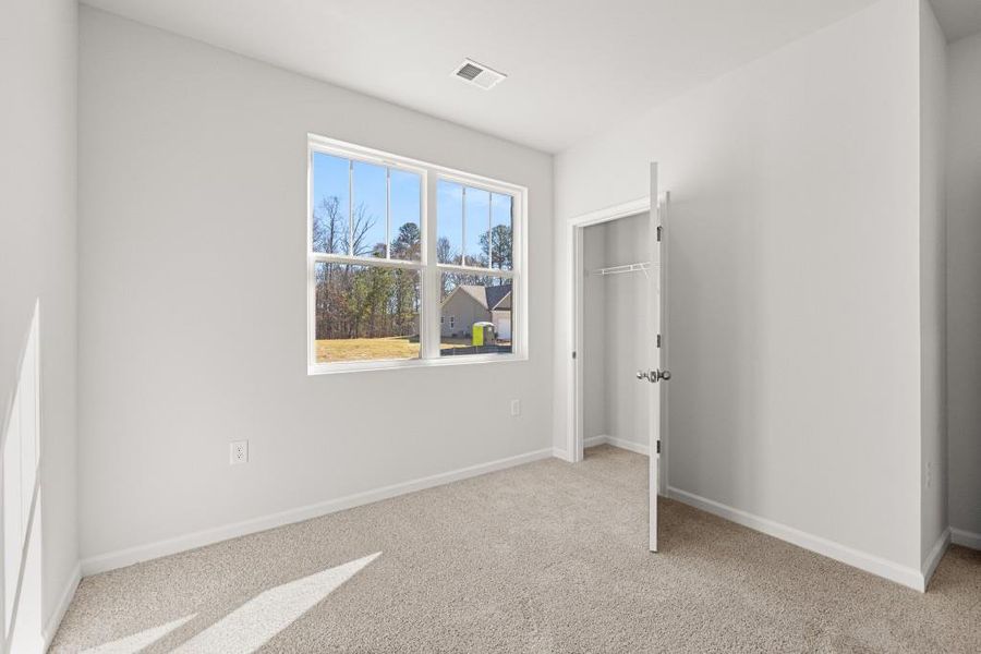 Spacious, unfurnished interior of a new home in Northwoods at Mirror Lake, Villa Rica (Image 26).