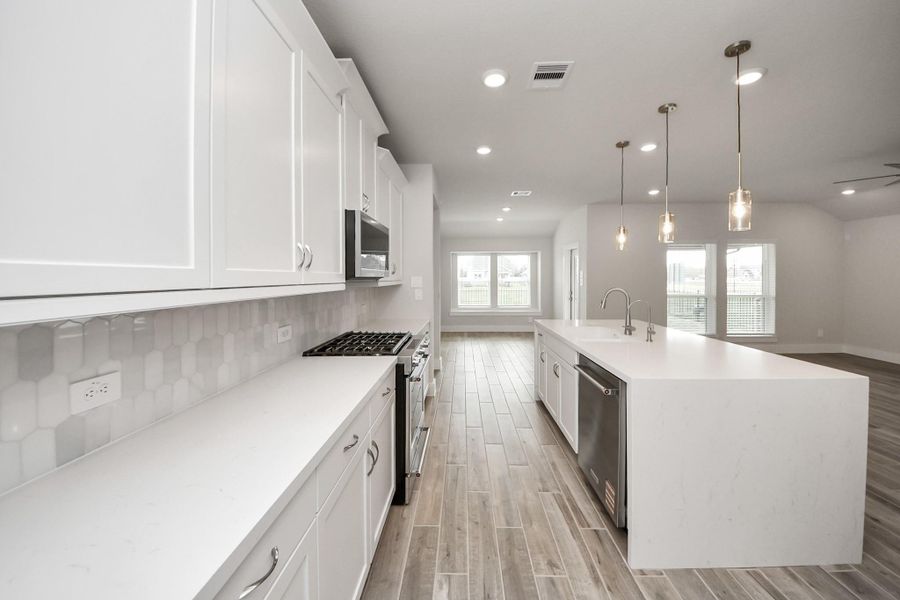Furnished interior view inside a new home in Laurel Landing: Landmark Collection, Alvin (Image 5). Furnished interior view inside a new home in Laurel Landing: Landmark Collection, Alvin (Image 5).