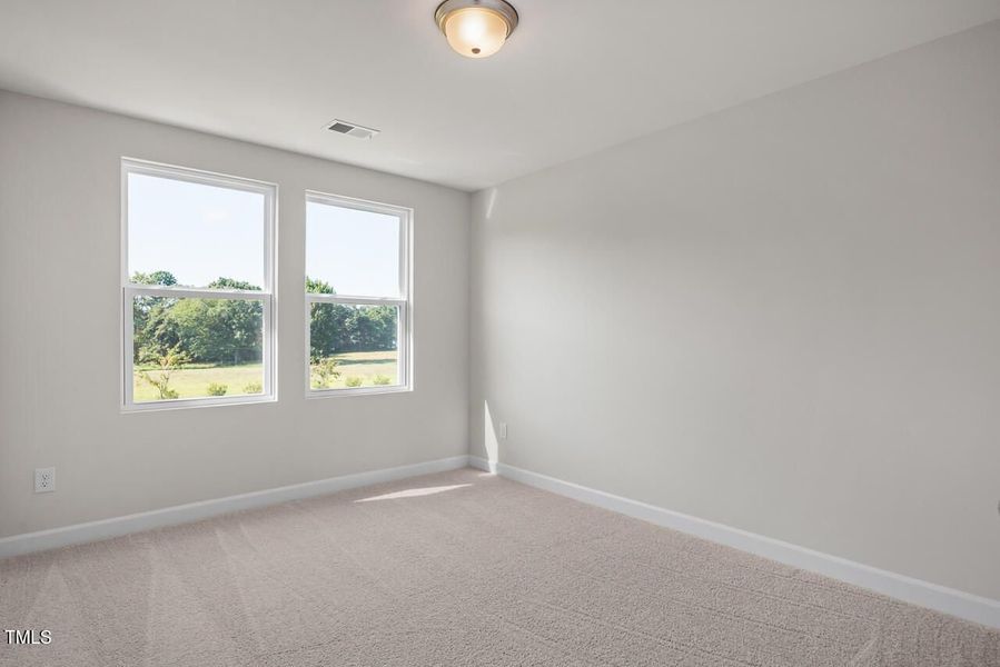 Spacious, unfurnished interior of a new home in Springvale, Fuquay Varina (Image 28).