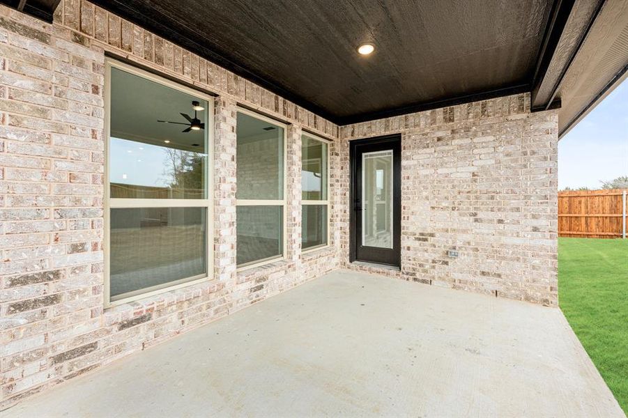 Exterior details and patio area of a home in Grand Heritage, Lavon (Image 3).