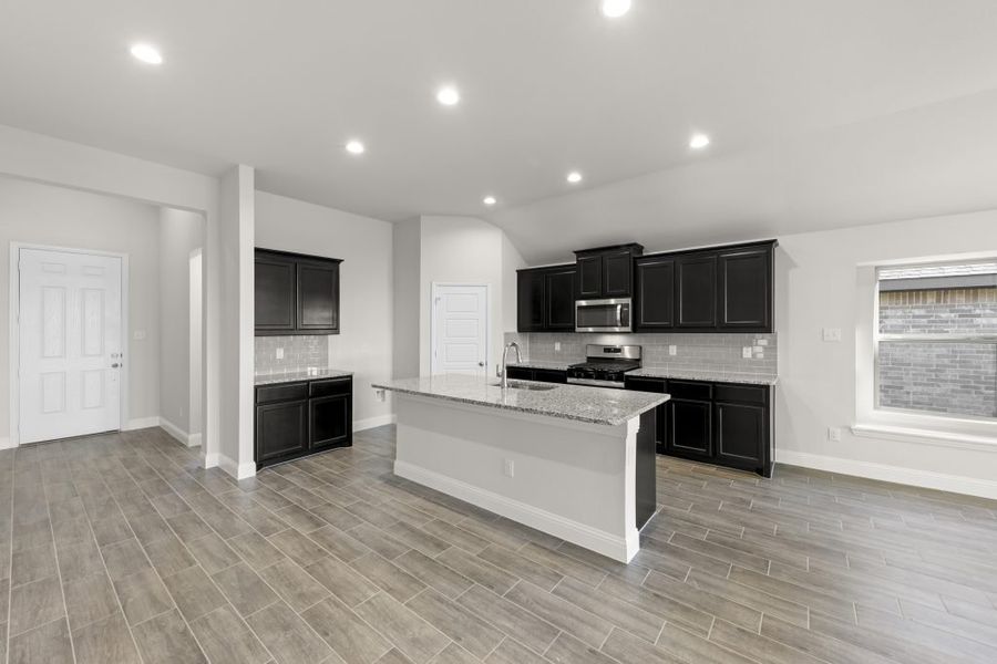 Representative exterior photo of a completed home built from the Kingston by Impression Homes in Arcadia Trails, Balch Springs, TX (Image 10).