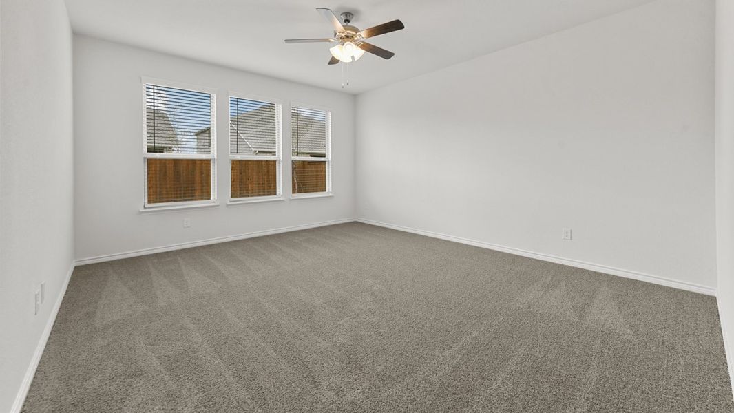 Representative unfurnished interior of a home built from the Bastrop by D.R. Horton in Woodcreek, Fate (Image 7).