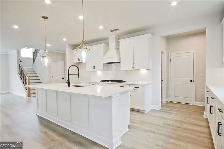 Furnished interior view inside a new home in The Paddocks at Doc Hughes, Buford (Image 13).