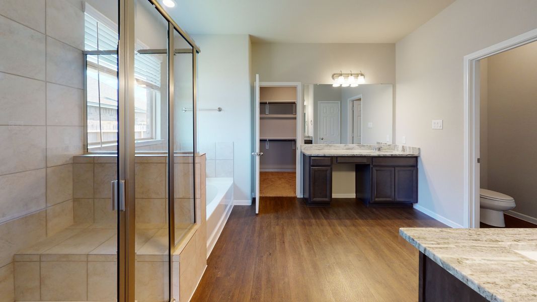 Representative furnished interior of a home built from the Floor Plan 3256 by Colina Homes in Grand Magnolia, Magnolia (Image 34).