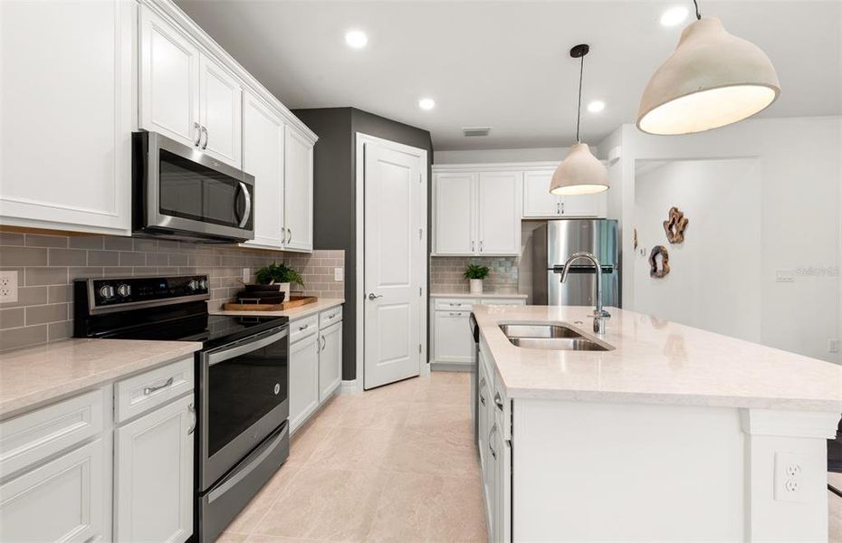Furnished interior view inside a new home in The Strand at Cedar Grove, North Port (Image 23).