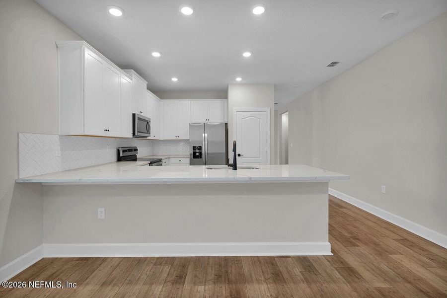 Furnished interior view inside a new home in , Jacksonville (Image 7). Furnished interior view inside a new home in , Jacksonville (Image 7).