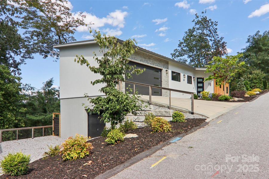 Front exterior of a new home in , Hendersonville, NC, highlighting curb appeal (Image 22).