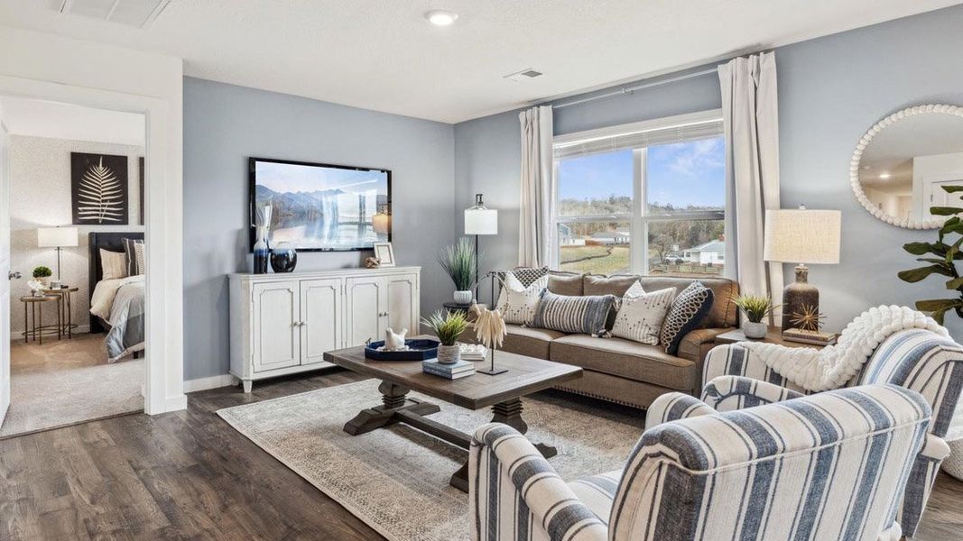 Representative furnished interior of a home built from the Freeport by D.R. Horton in The Hideaway at Fox Meadows, Bluff City (Image 11).