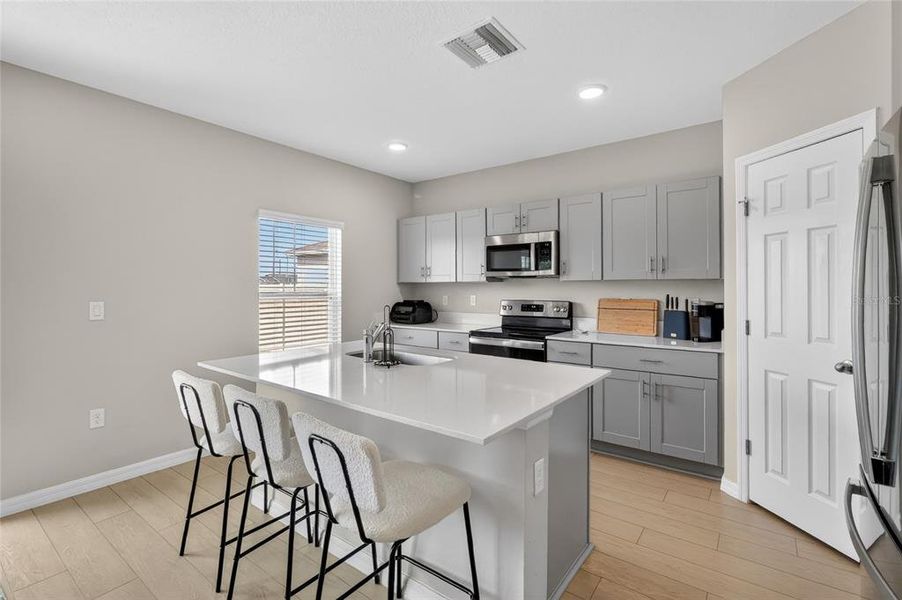 Furnished interior view inside a new home in Scenic Terrace, Haines City (Image 17).