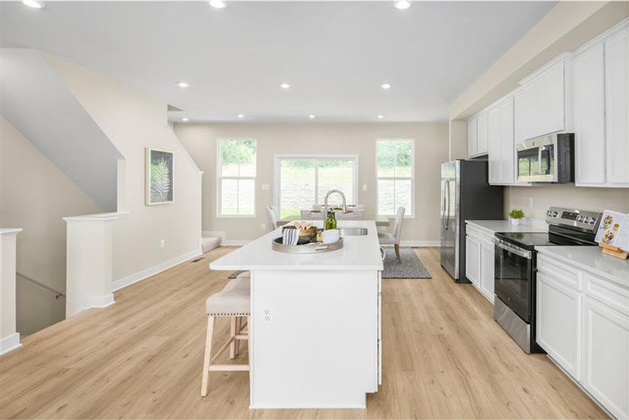 Representative furnished interior of a home built from the Overture by Ryan Homes in Moore Farm Townhomes, Indian Trail (Image 8).
