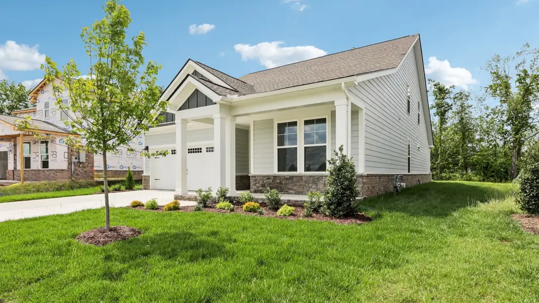 Front exterior with 2-car garage