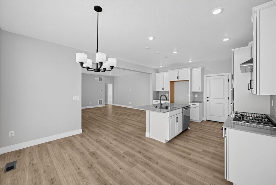 Furnished interior view inside a new home in Trailstone, Arvada (Image 6).