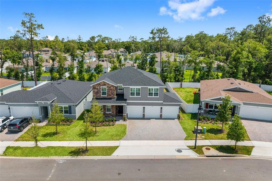 Front exterior of a new home in , Deland, FL, highlighting curb appeal (Image 32).