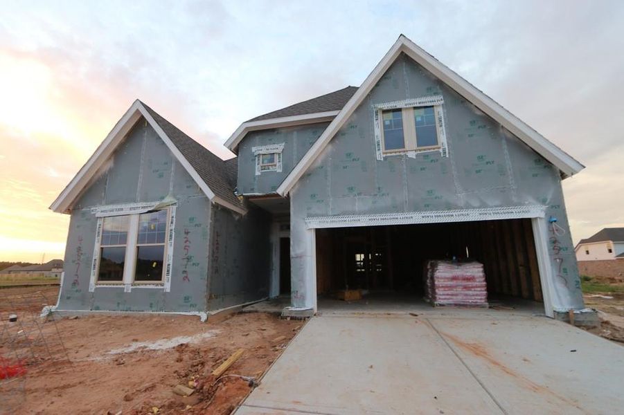 In-progress construction of a new home in Escondido 50' Homesites, Magnolia, TX (Image 38).
